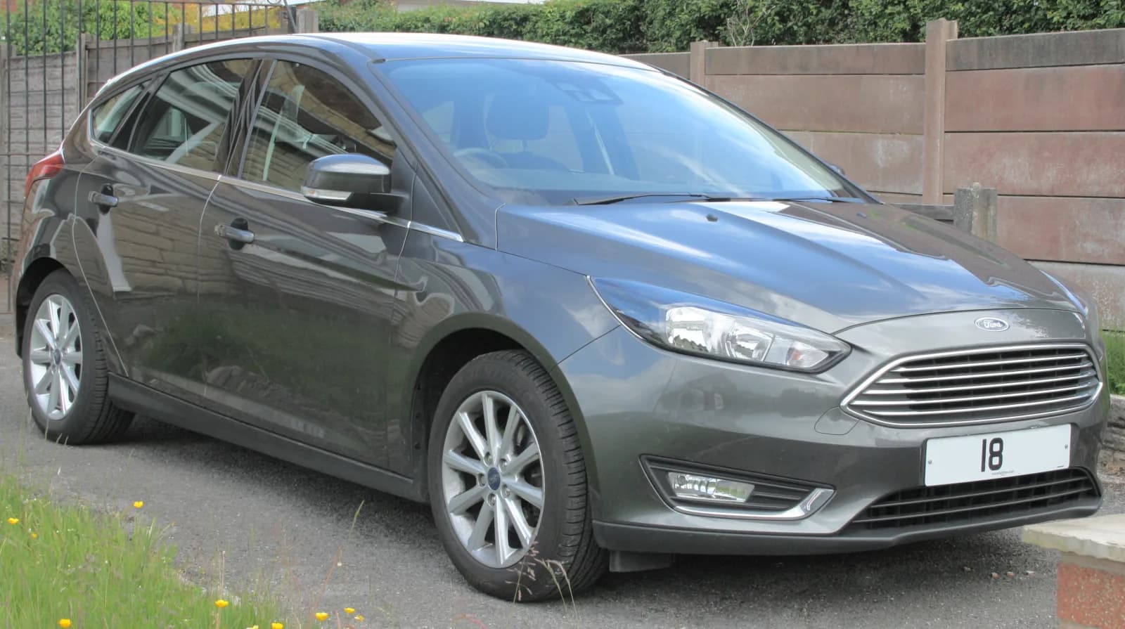 Grey Ford Focus hatchback, front three-quarter view