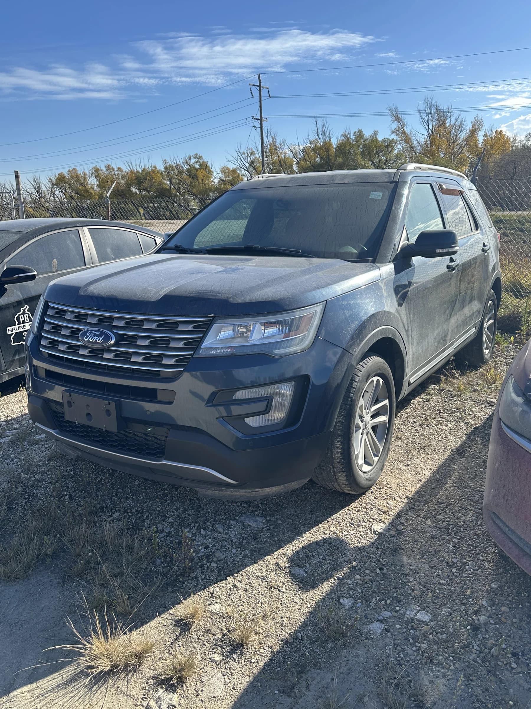Blue 2017 Ford Explorer XLT SUV, front view