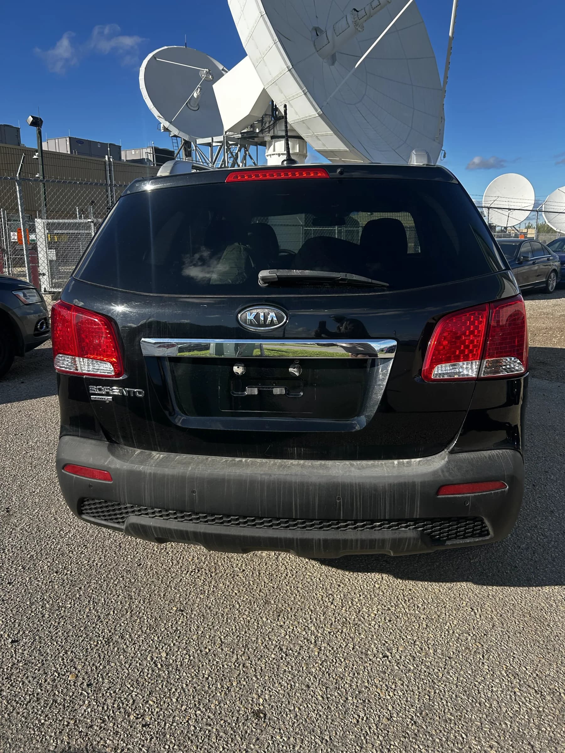 Black 2013 Kia Sorento LX AWD SUV, rear three-quarter view