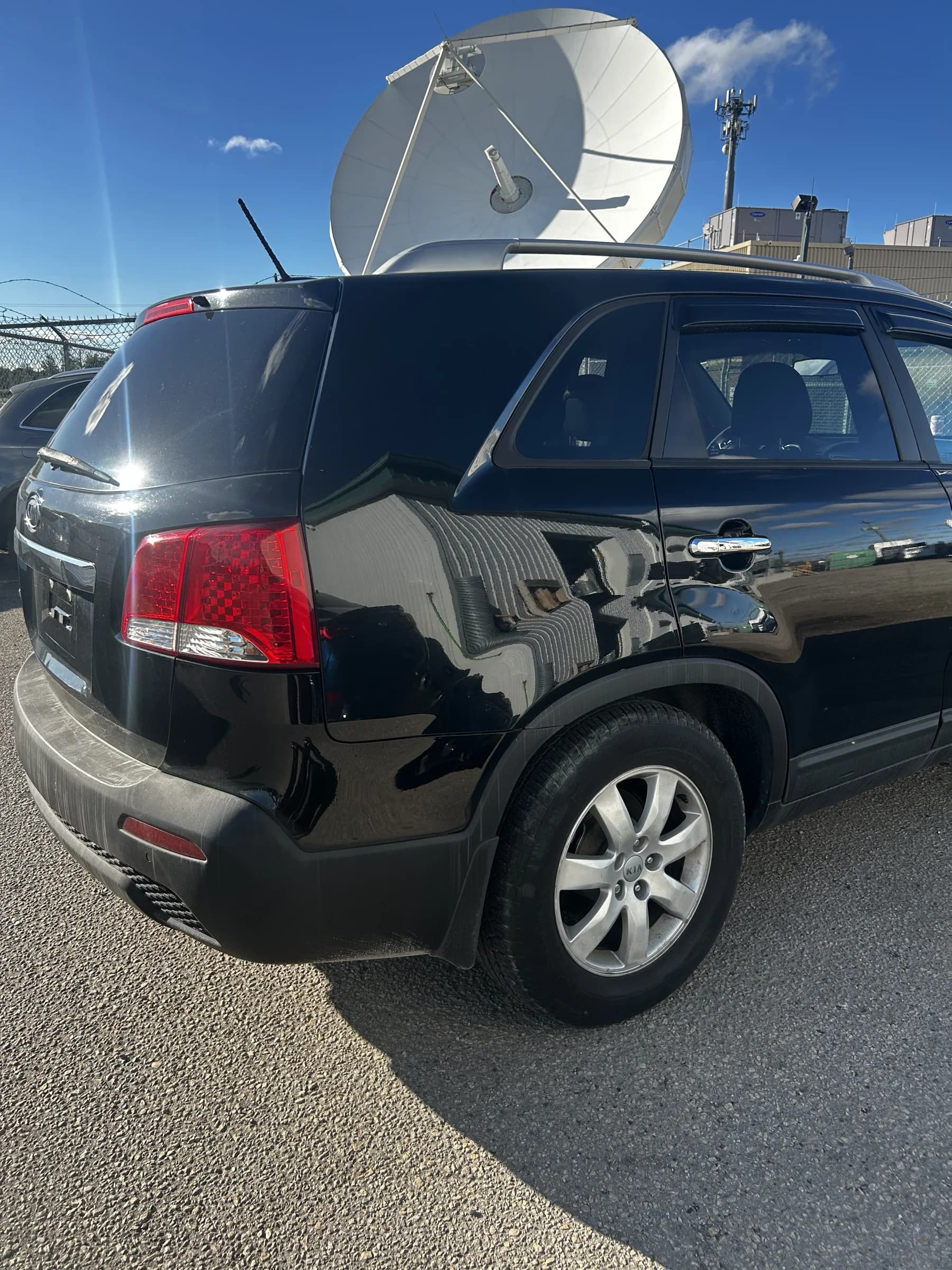 Black 2013 Kia Sorento LX AWD SUV, rear view