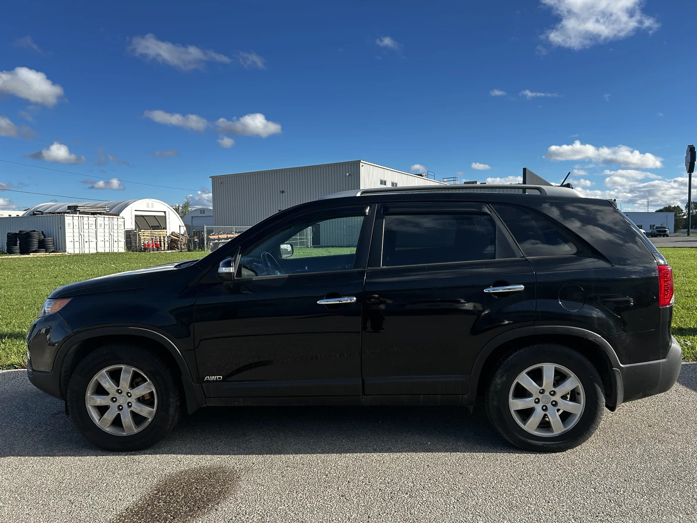 Black 2013 Kia Sorento LX AWD SUV, driver-side profile